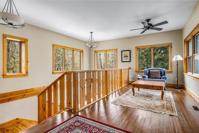 80220 Linden Hills St, Covert, MI 49043 - sitting room featuring healthy amount of natural light, wood finished floors, and a ceiling fan