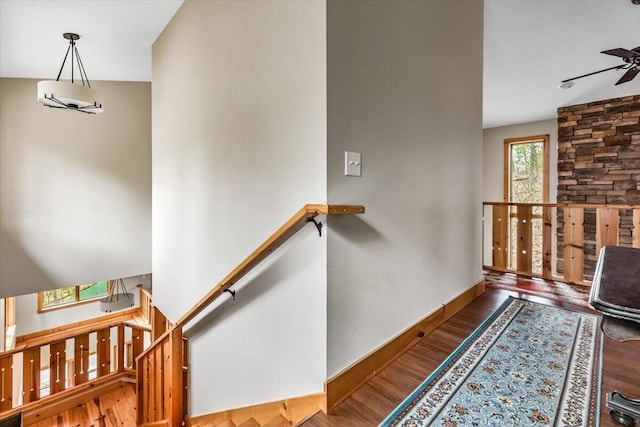 80220 Linden Hills St, Covert, MI 49043 - hallway with an upstairs landing, wood finished floors, and baseboards