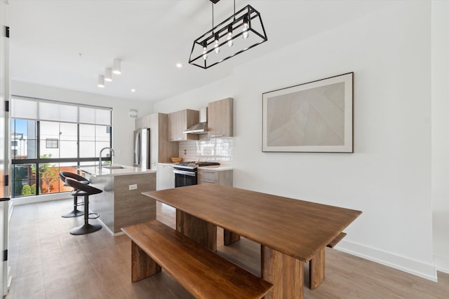 533 E Harrison Unit 3, Royal Oak, MI 48067 - dining room featuring light wood-type flooring, recessed lighting, and baseboards