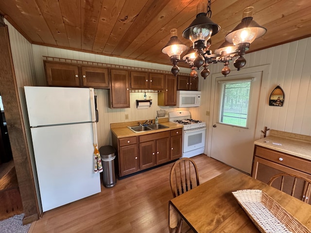 3574 N Comanche Trl, Branch, MI 49402 - kitchen with white appliances, wood ceiling, a sink, light wood finished floors, and light countertops