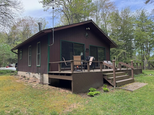 3574 N Comanche Trl, Branch, MI 49402 - rear view of house with a yard, a deck, and crawl space