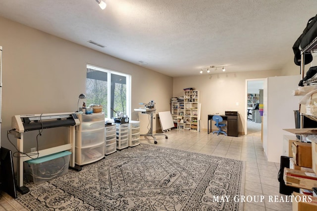 3729 Windshire Dr SE, Grand Rapids, MI 49546 - playroom featuring tile patterned floors and a textured ceiling