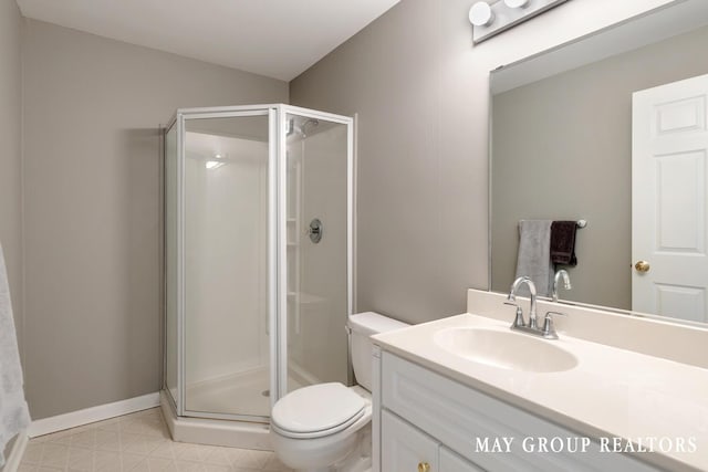 3729 Windshire Dr SE, Grand Rapids, MI 49546 - full bath featuring a stall shower, vanity, and toilet
