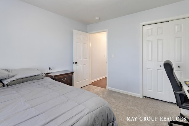 3729 Windshire Dr SE, Grand Rapids, MI 49546 - carpeted bedroom with a closet and baseboards