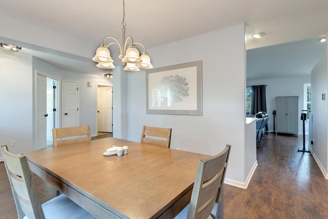 3729 Windshire Dr SE, Grand Rapids, MI 49546 - dining area with dark wood-style floors, a chandelier, baseboards, and recessed lighting
