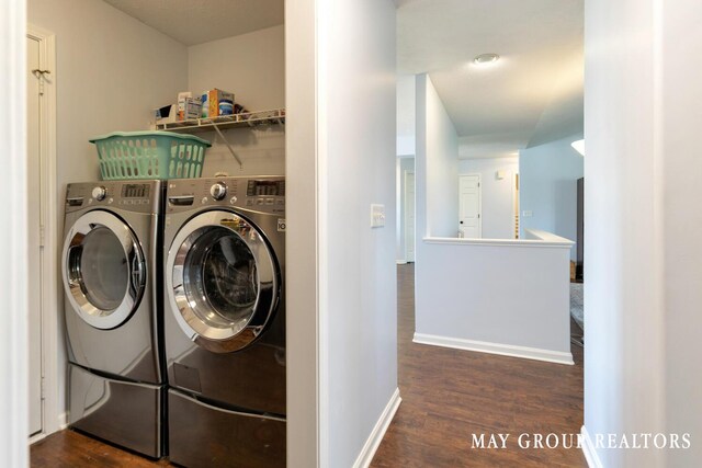 3729 Windshire Dr SE, Grand Rapids, MI 49546 - washroom with dark wood finished floors, separate washer and dryer, and baseboards