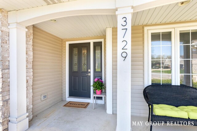 3729 Windshire Dr SE, Grand Rapids, MI 49546 - entrance to property featuring covered porch
