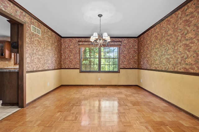 275 S Bluffwood Ter, Saint Joseph, MI 49085 - unfurnished room featuring a chandelier, baseboards, wallpapered walls, and ornamental molding