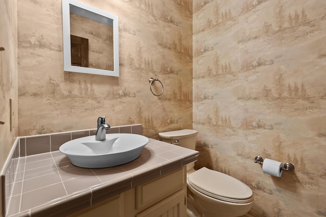 275 S Bluffwood Ter, Saint Joseph, MI 49085 - bathroom featuring toilet and vanity