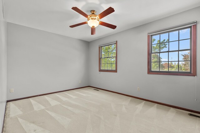 275 S Bluffwood Ter, Saint Joseph, MI 49085 - carpeted spare room with ceiling fan and baseboards