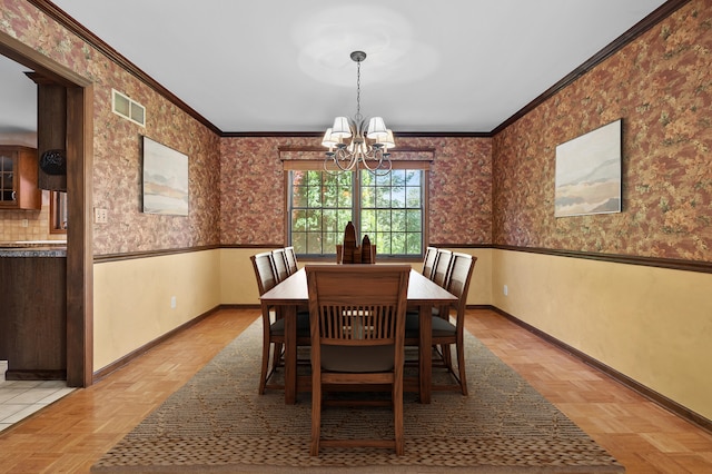 275 S Bluffwood Ter, Saint Joseph, MI 49085 - dining room featuring wallpapered walls, a chandelier, a wainscoted wall, baseboards, and ornamental molding
