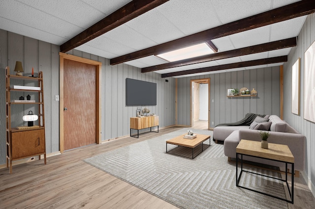 275 S Bluffwood Ter, Saint Joseph, MI 49085 - living room with wood finished floors, beamed ceiling, and wood walls