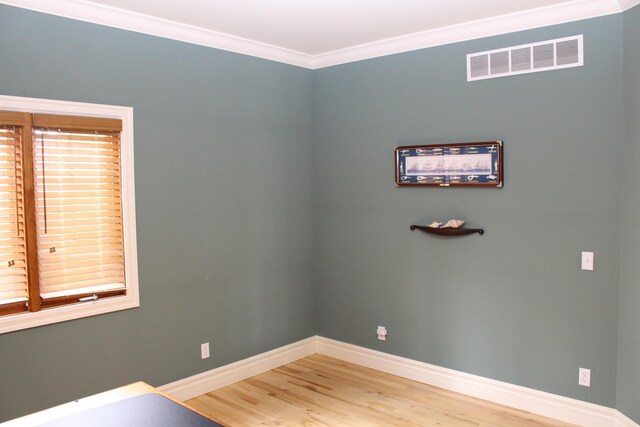 60 Timber Ridge Ct, Milan, MI 48160 - empty room featuring wood finished floors and crown molding