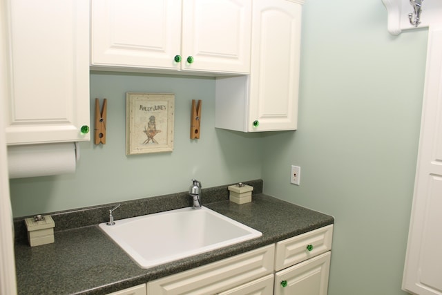 60 Timber Ridge Ct, Milan, MI 48160 - kitchen with dark countertops and white cabinetry