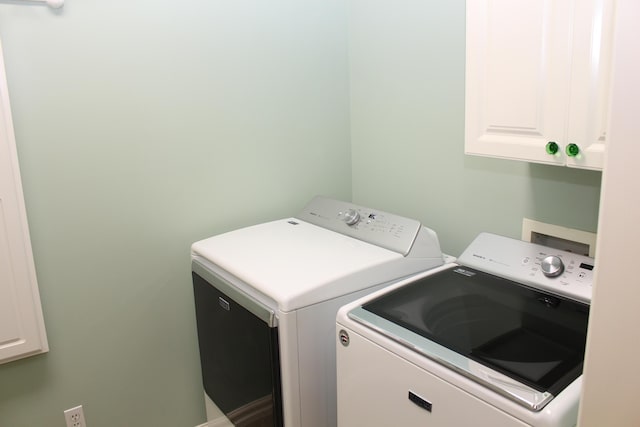 60 Timber Ridge Ct, Milan, MI 48160 - washroom featuring cabinet space and washer and clothes dryer