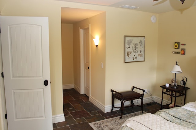 60 Timber Ridge Ct, Milan, MI 48160 - bedroom with baseboards and dark stone finish flooring
