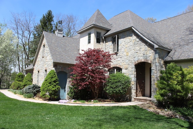 60 Timber Ridge Ct, Milan, MI 48160 - view of front of house featuring stone siding and a front yard