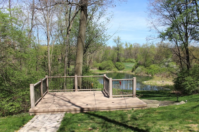 60 Timber Ridge Ct, Milan, MI 48160 - view of home's community with a deck with water view, a yard, and a forest view