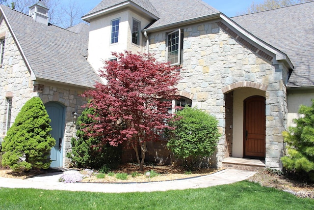 60 Timber Ridge Ct, Milan, MI 48160 - view of front of property with stone siding and a high end roof