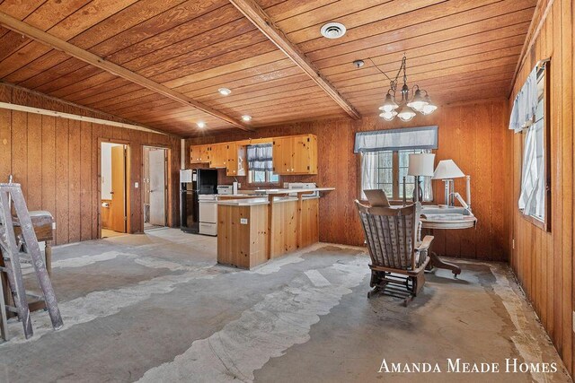12345 92nd St SE, Alto, MI 49302 - kitchen featuring freestanding refrigerator, a peninsula, an inviting chandelier, and wood ceiling