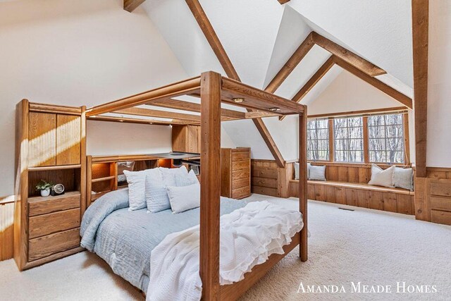 12345 92nd St SE, Alto, MI 49302 - bedroom featuring visible vents, wainscoting, wooden walls, vaulted ceiling with beams, and carpet flooring