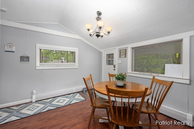 1266 E 88th St, Newaygo, MI 49337 - dining space with baseboards, vaulted ceiling, and wood finished floors