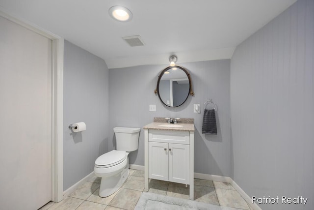1266 E 88th St, Newaygo, MI 49337 - bathroom with vanity, toilet, and baseboards