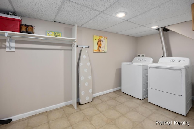 1266 E 88th St, Newaygo, MI 49337 - laundry area featuring washing machine and clothes dryer and baseboards