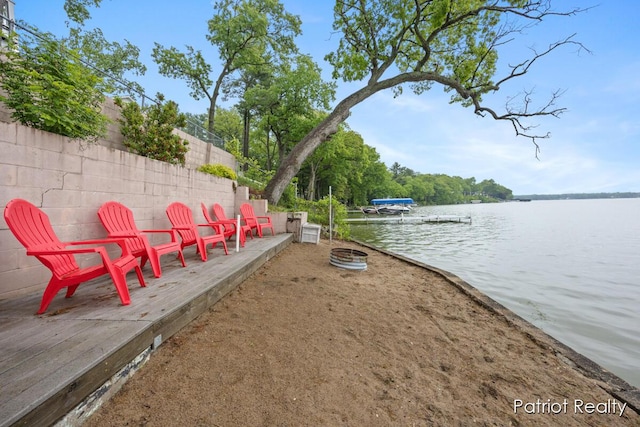 1266 E 88th St, Newaygo, MI 49337 - view of yard with a water view and a boat dock