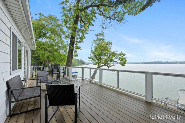 1266 E 88th St, Newaygo, MI 49337 - wooden terrace with a water view