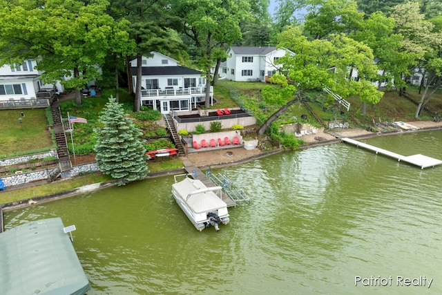 1266 E 88th St, Newaygo, MI 49337 - dock area with stairs and a deck with water view