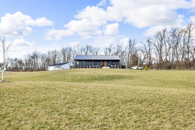 7499 Mathews Rd, Spring Arbor, MI 49283 - view of yard featuring an outbuilding and an outdoor structure