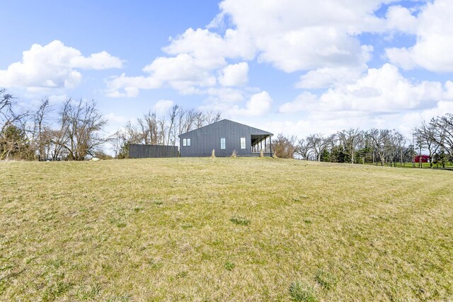 7499 Mathews Rd, Spring Arbor, MI 49283 - view of yard with an outbuilding