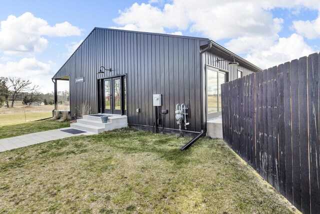 7499 Mathews Rd, Spring Arbor, MI 49283 - view of outbuilding with fence and french doors