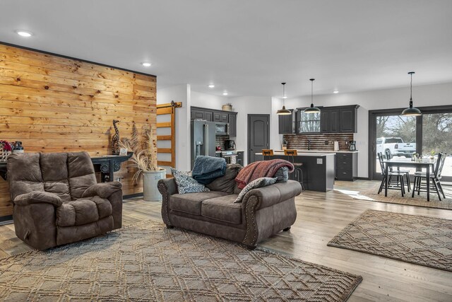 7499 Mathews Rd, Spring Arbor, MI 49283 - living area with recessed lighting and light wood-type flooring