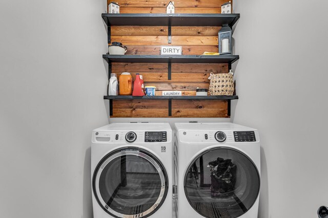 7499 Mathews Rd, Spring Arbor, MI 49283 - washroom featuring laundry area and washer and clothes dryer