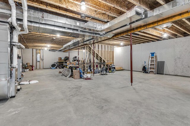 7499 Mathews Rd, Spring Arbor, MI 49283 - unfinished below grade area with gas water heater