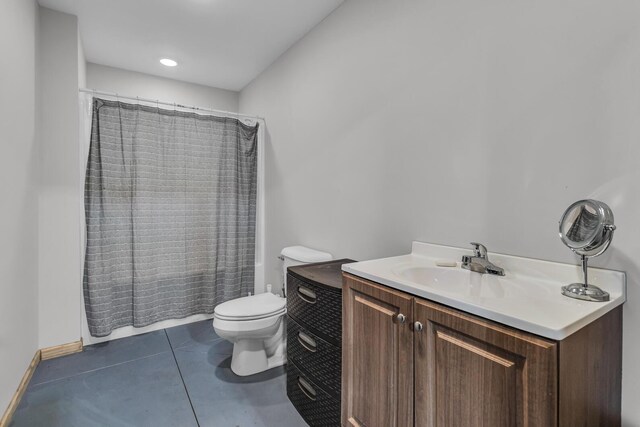 7499 Mathews Rd, Spring Arbor, MI 49283 - bathroom featuring vanity, toilet, tile patterned floors, baseboards, and curtained shower