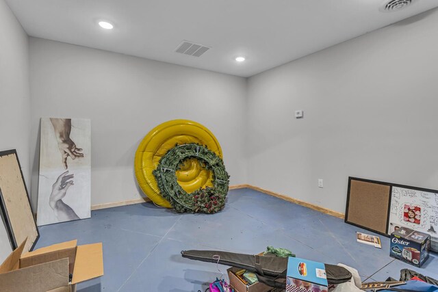 7499 Mathews Rd, Spring Arbor, MI 49283 - interior space with visible vents, baseboards, and concrete floors