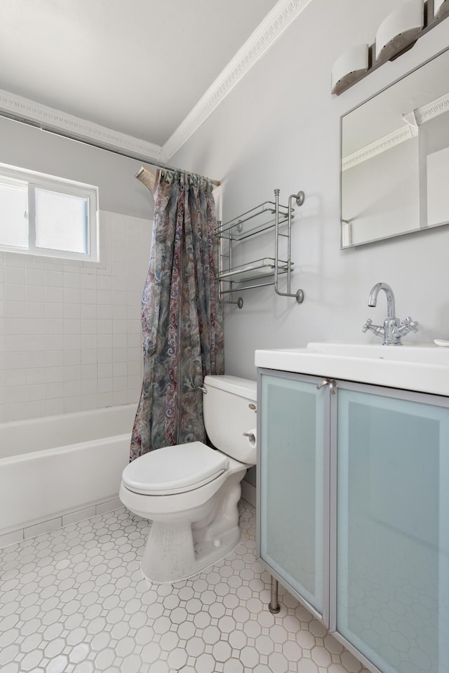 bathroom featuring toilet, shower / tub combo, and vanity