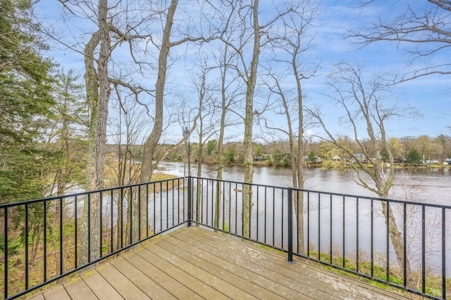 18559 Kreig Dr, Big Rapids, MI 49307 - wooden deck with a water view