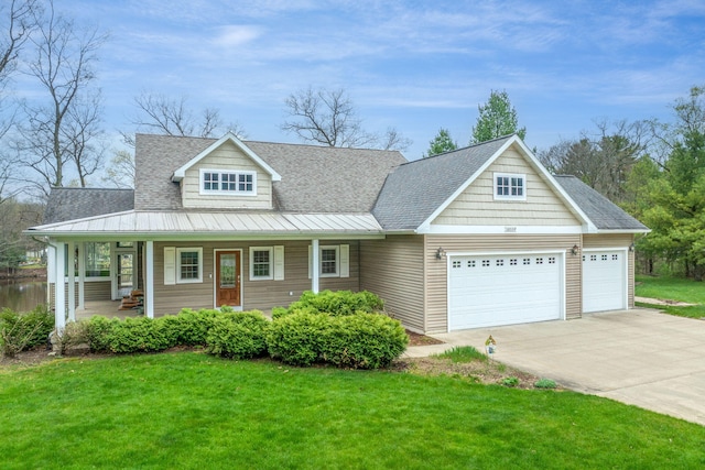18559 Kreig Dr, Big Rapids, MI 49307 - view of front facade featuring a porch, roof with shingles, a front yard, a garage, and concrete driveway