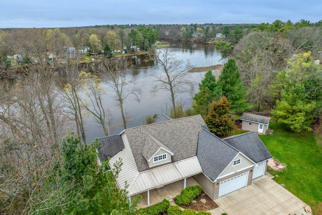 18559 Kreig Dr, Big Rapids, MI 49307 - birds eye view of property with a water view and a forest view