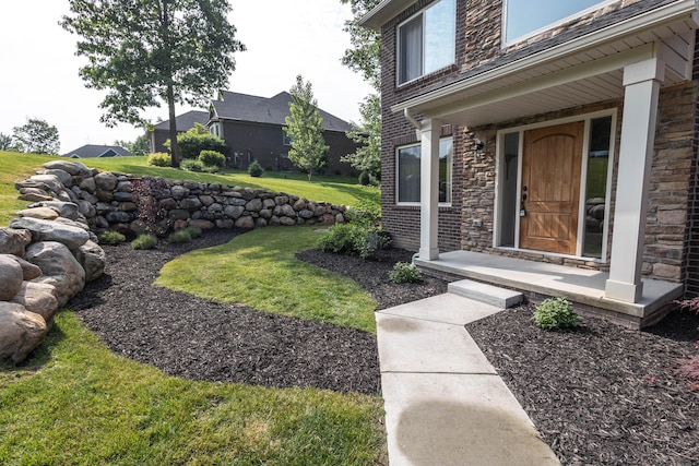 270 Fairway View Dr, Oxford, MI 48371 - property entrance featuring stone siding, a lawn, and brick siding