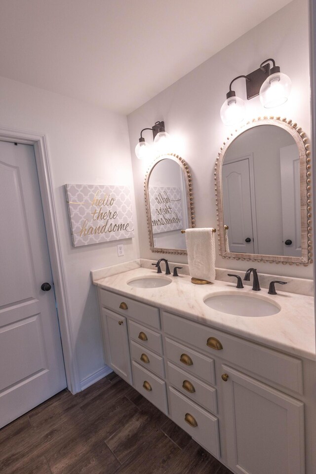 270 Fairway View Dr, Oxford, MI 48371 - bathroom with double vanity and wood finished floors
