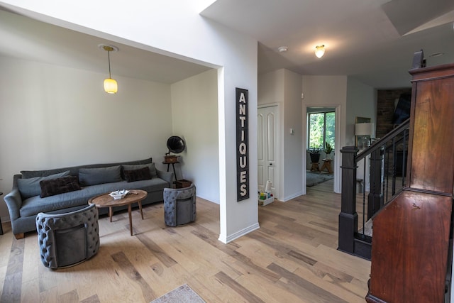 270 Fairway View Dr, Oxford, MI 48371 - living room featuring light wood-style flooring and stairway