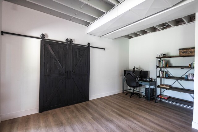 270 Fairway View Dr, Oxford, MI 48371 - basement featuring a barn door, wood finished floors, and an office area