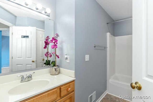 full bathroom featuring vanity and bathtub / shower combination
