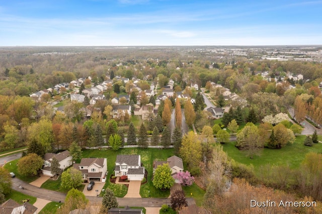 aerial overview of property's location featuring nearby suburban area