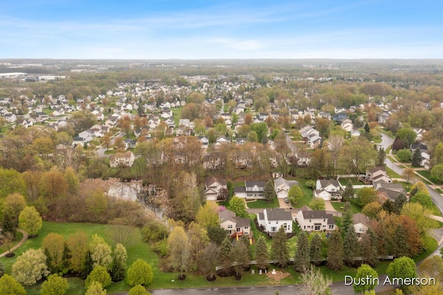 aerial view of property's location with nearby suburban area